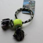 Ring tug toy with tennis balll